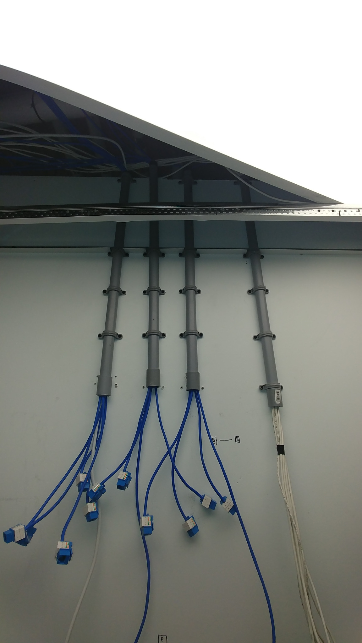 Network cabling after conduit and termination work